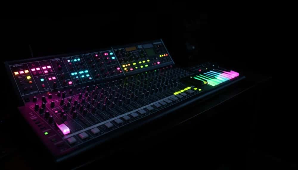 Neon-lit AI music production console representing modern AI music generator tools