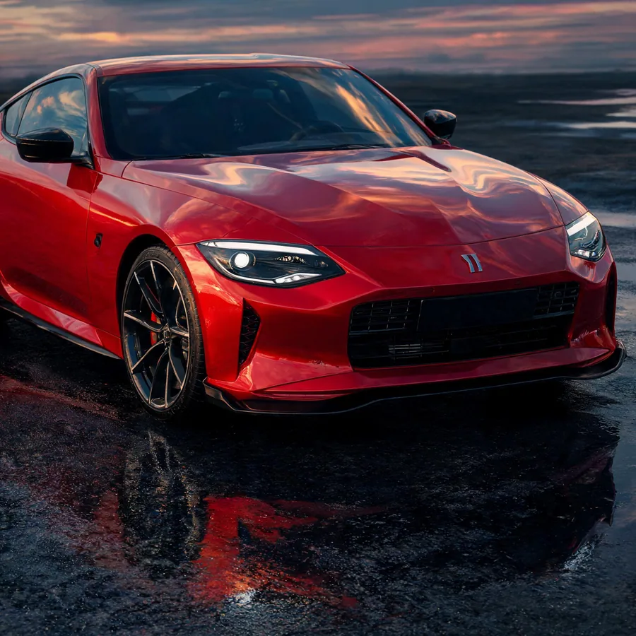Original square photo of a red sports car.