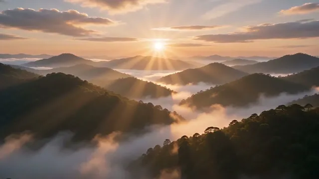 End frame: misty mountains at sunrise.